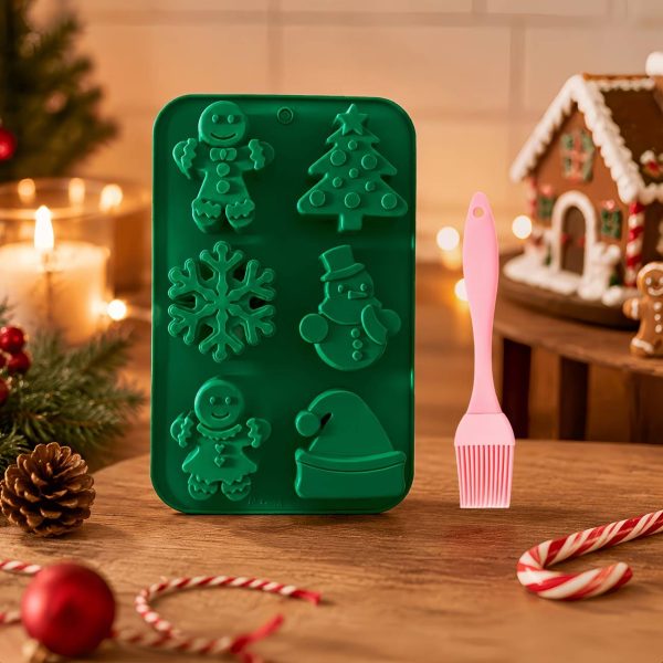 🎄🎅 قالب سيليكون الكريسماس 6 تجاويف – أشكال احتفالية مميزة 🎁🔔🎅 تصميمات مستوحاة من أجواء الكريسماس: 🎄 شجرة عيد الميلاد 🔔 الجرس 🎁 صندوق الهدايا 🧦 جورب الكريسماس ❄️ رجل الثلج وسانتا كلوز